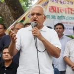 দিনাজপুরে জুলাই গণ-অভ্যুত্থান দিবসের অনুষ্ঠানে মঞ্চে বক্তব্য দিচ্ছেন জাহিদ হোসেন।